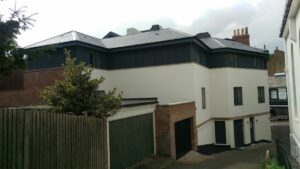 Basement + three storeys next to garage – party wall matters